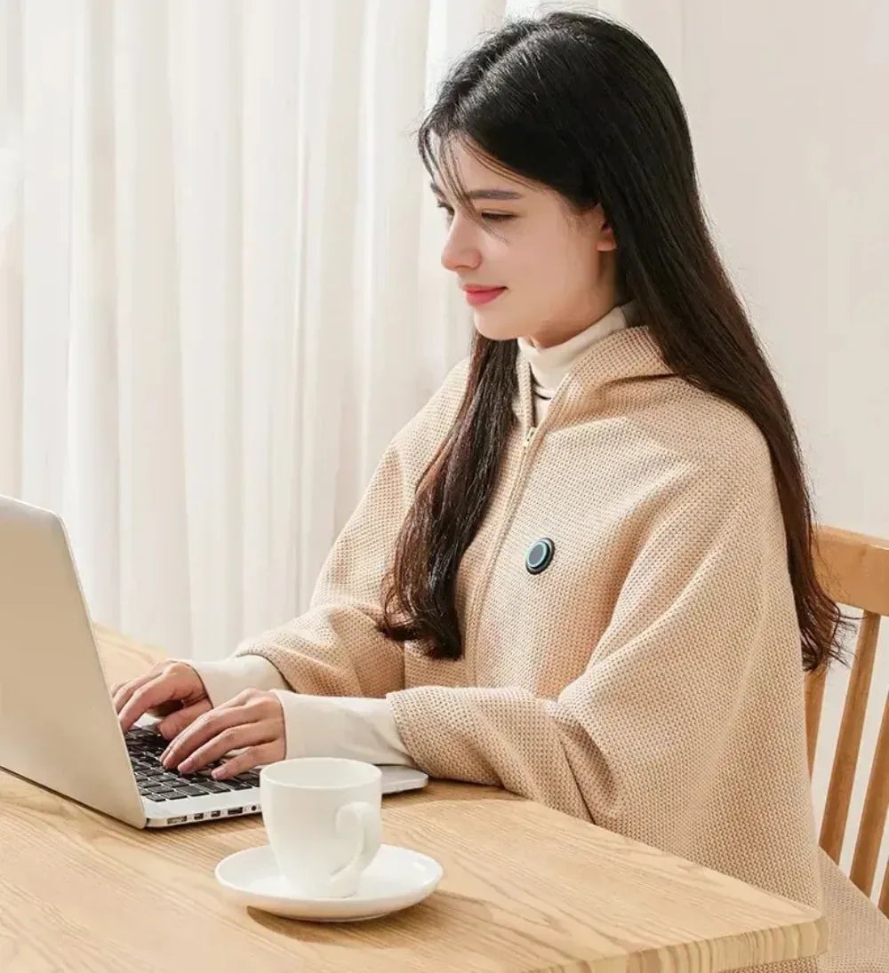 Multi purpose heated shawl for office home and travel