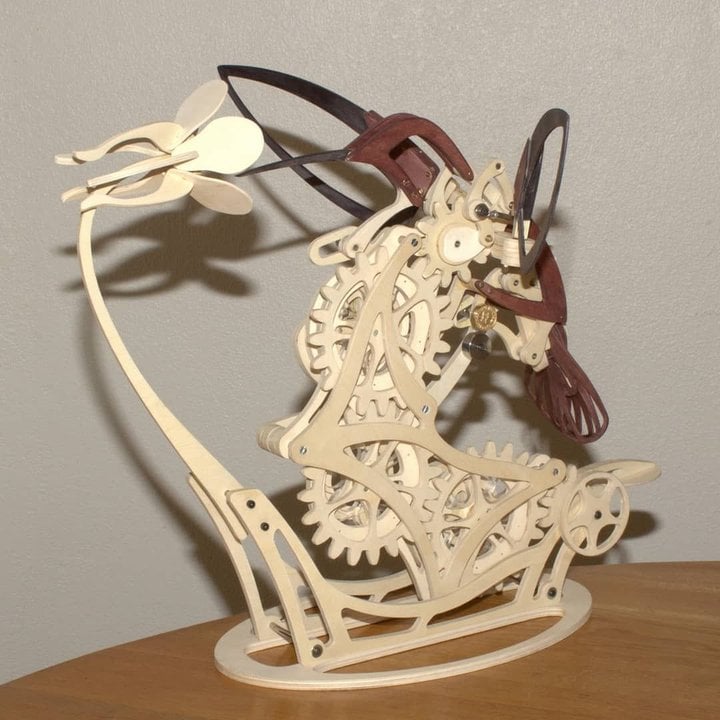 Assembled 3D wooden hummingbird sculpture on display