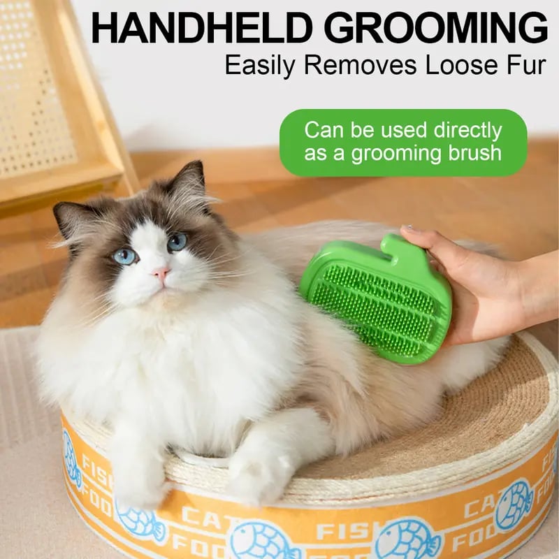 Cat groomer used as a handheld grooming brush