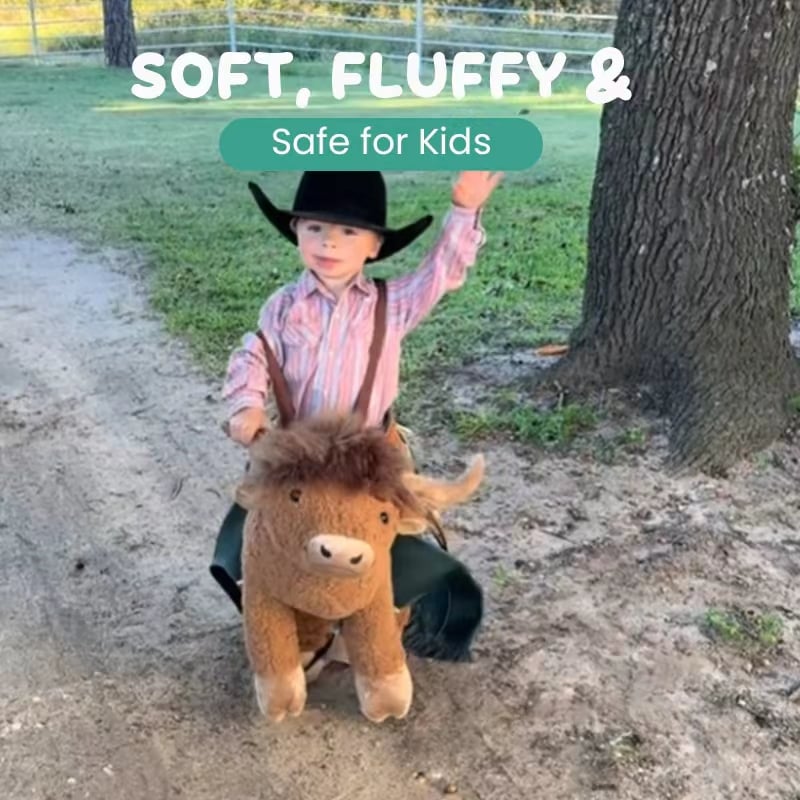 Child wearing Highland Cow Ride-On Costume