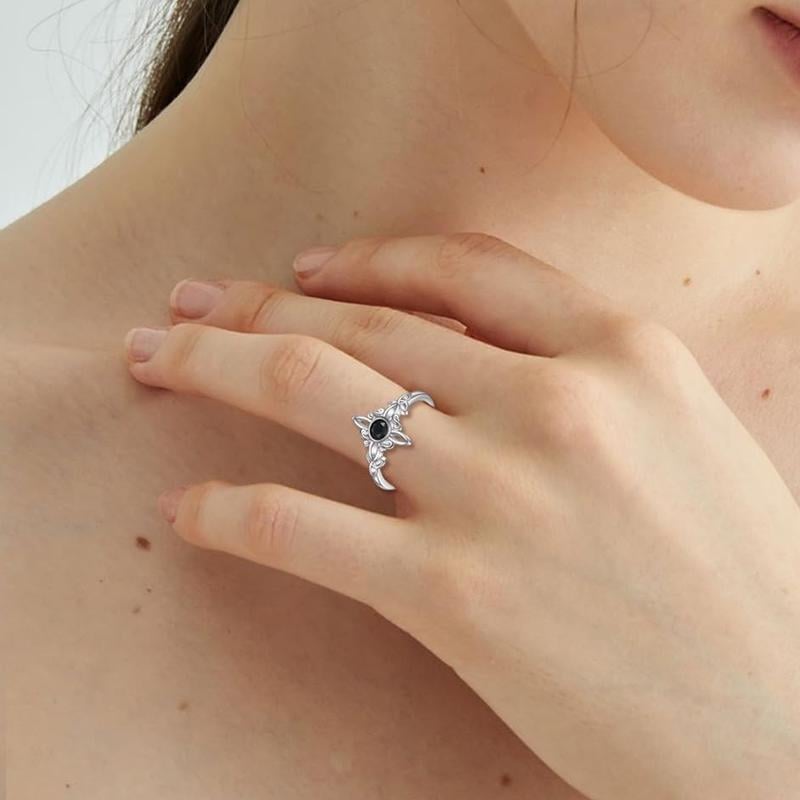Witch's Knot ring on a woman's finger