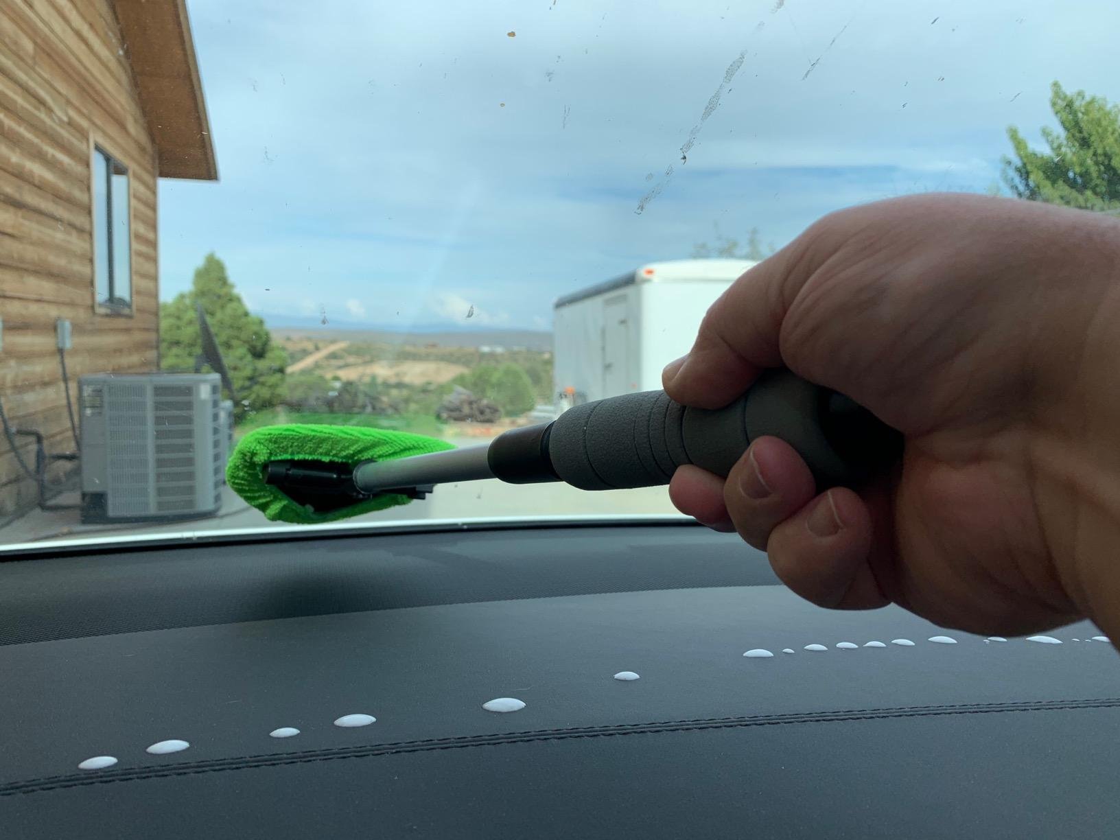 Makes those far corners of your dash easy to reach.