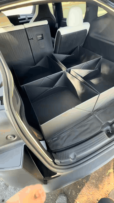 Four-piece trunk organizer opening and folding flat